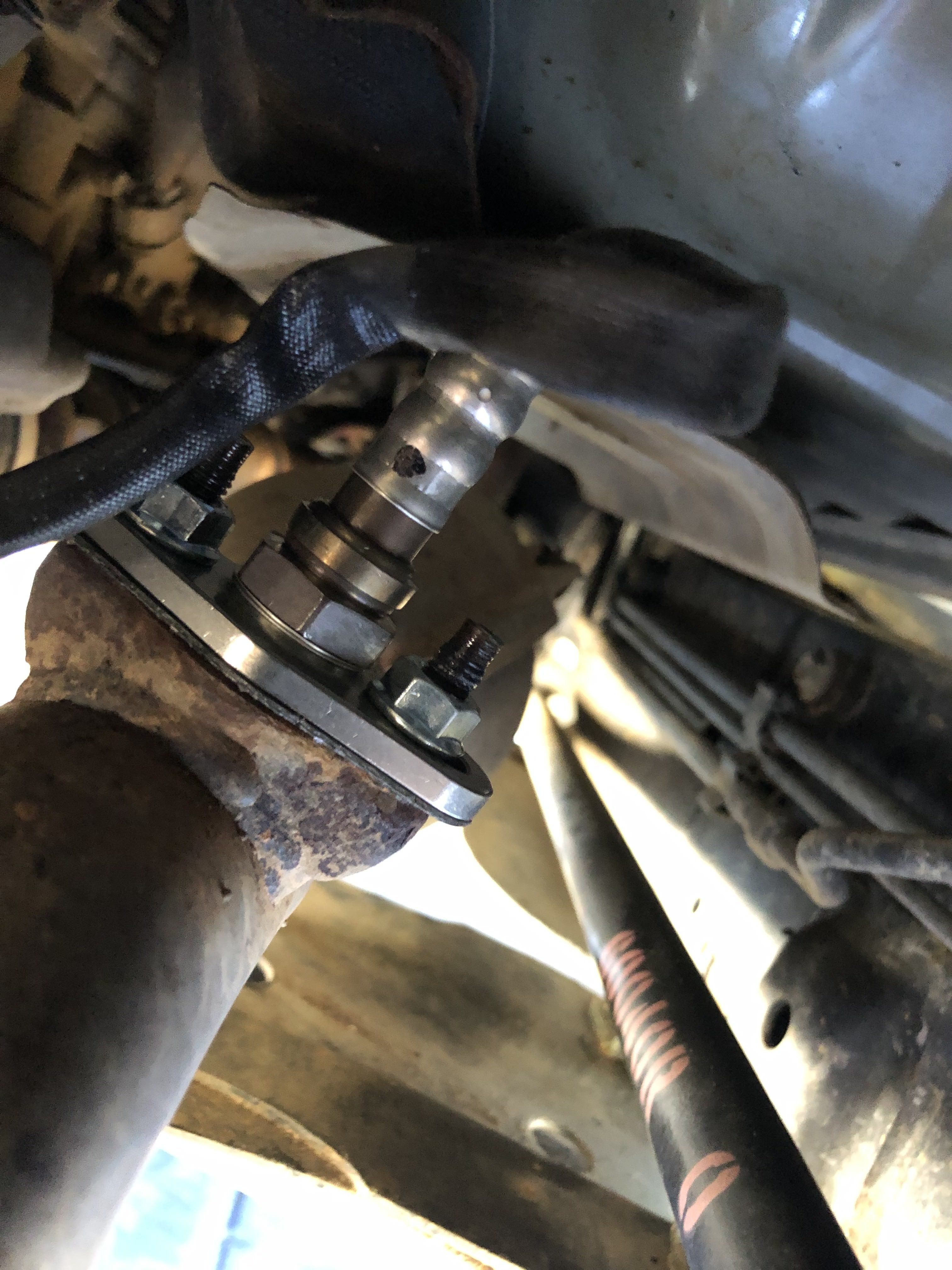 Took 3 days of soaking in PB blaster and every combination of breaker bar and pipe I could think of to finally bust the rusted nuts off.