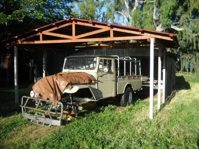 Truck on Blocks, workin in the dirt w mosquitoes suckin me dry.  axle seals need attention