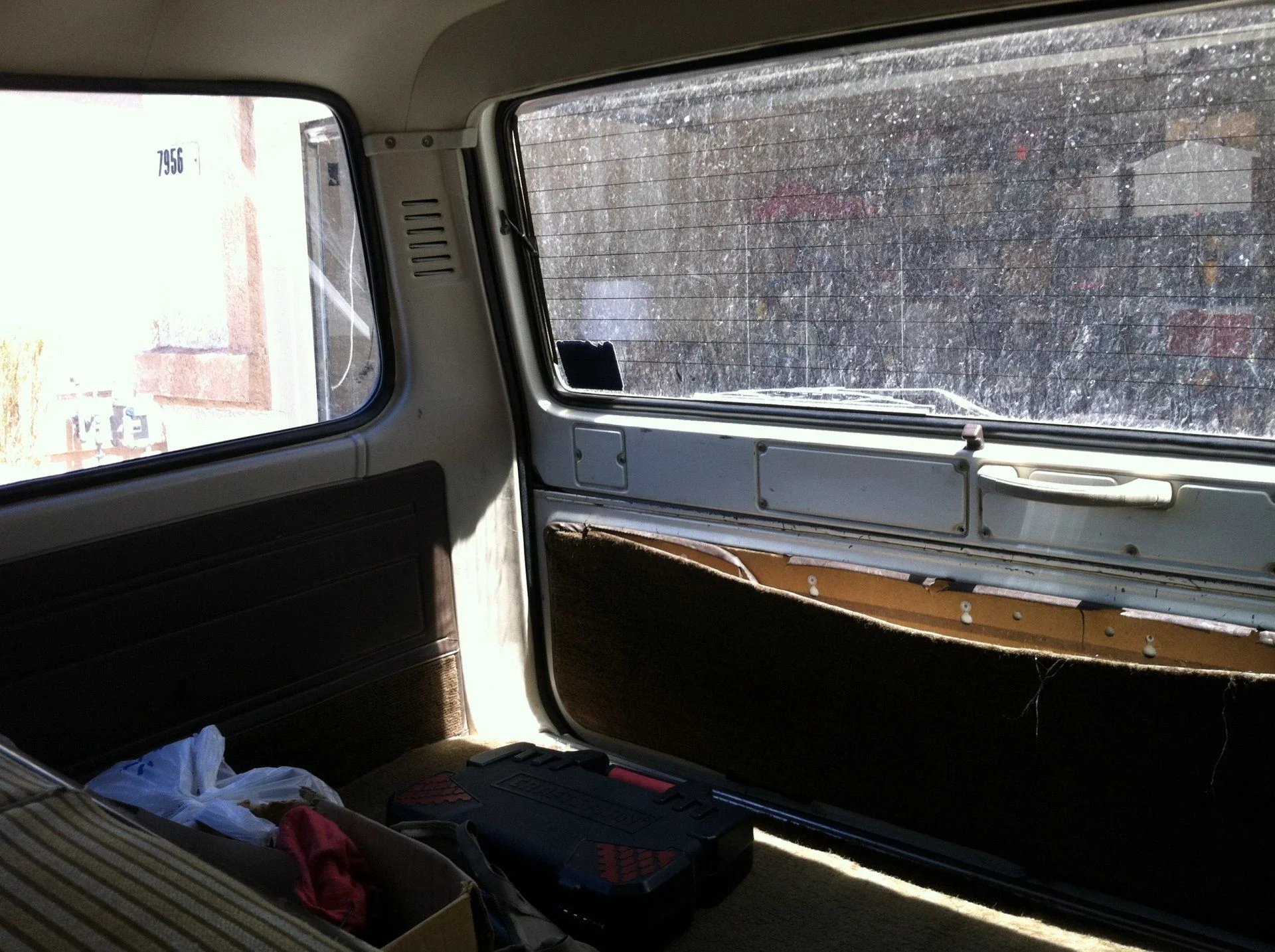 trunk area - with ripped carpet