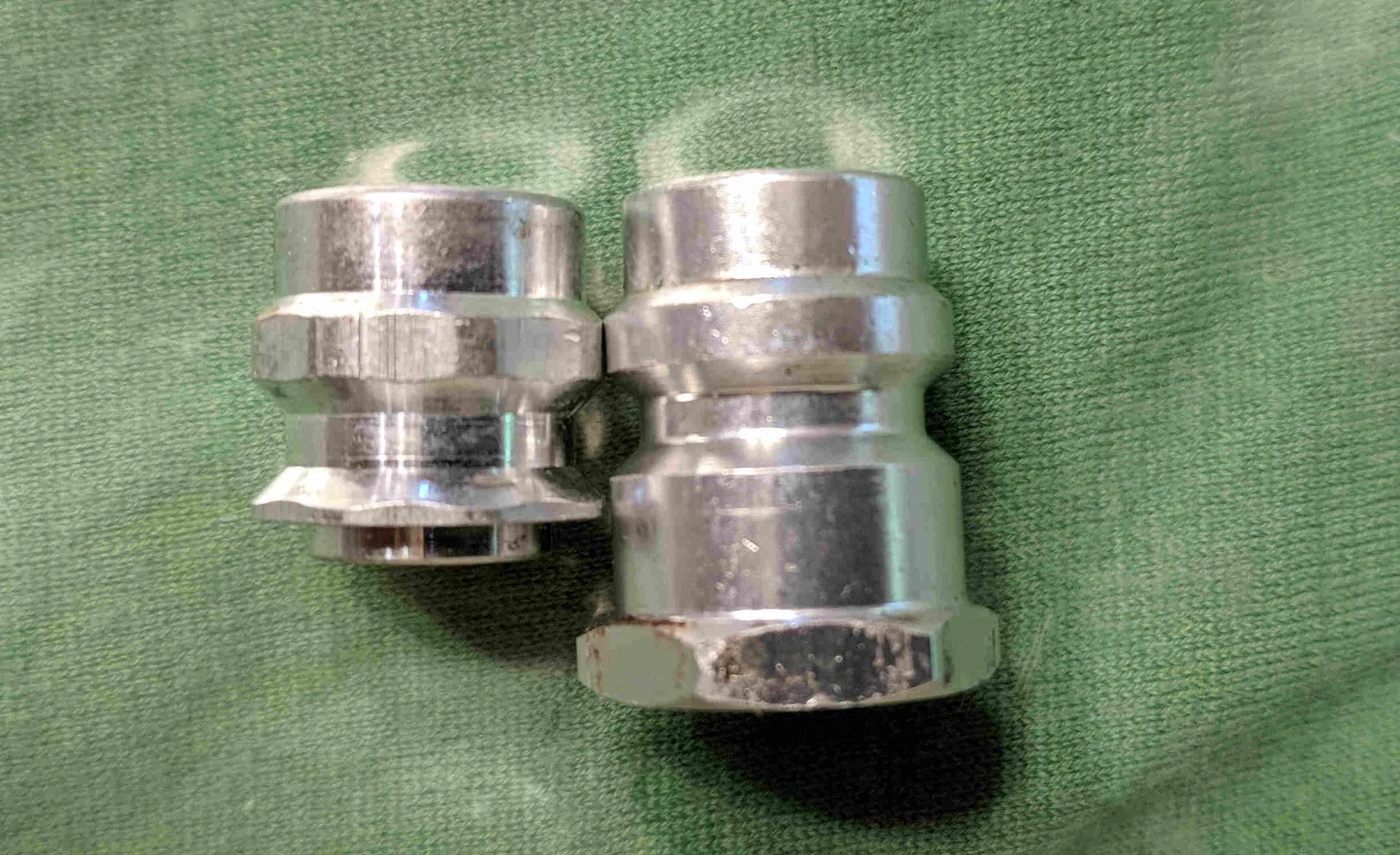 Two sizes of AC high side adapters