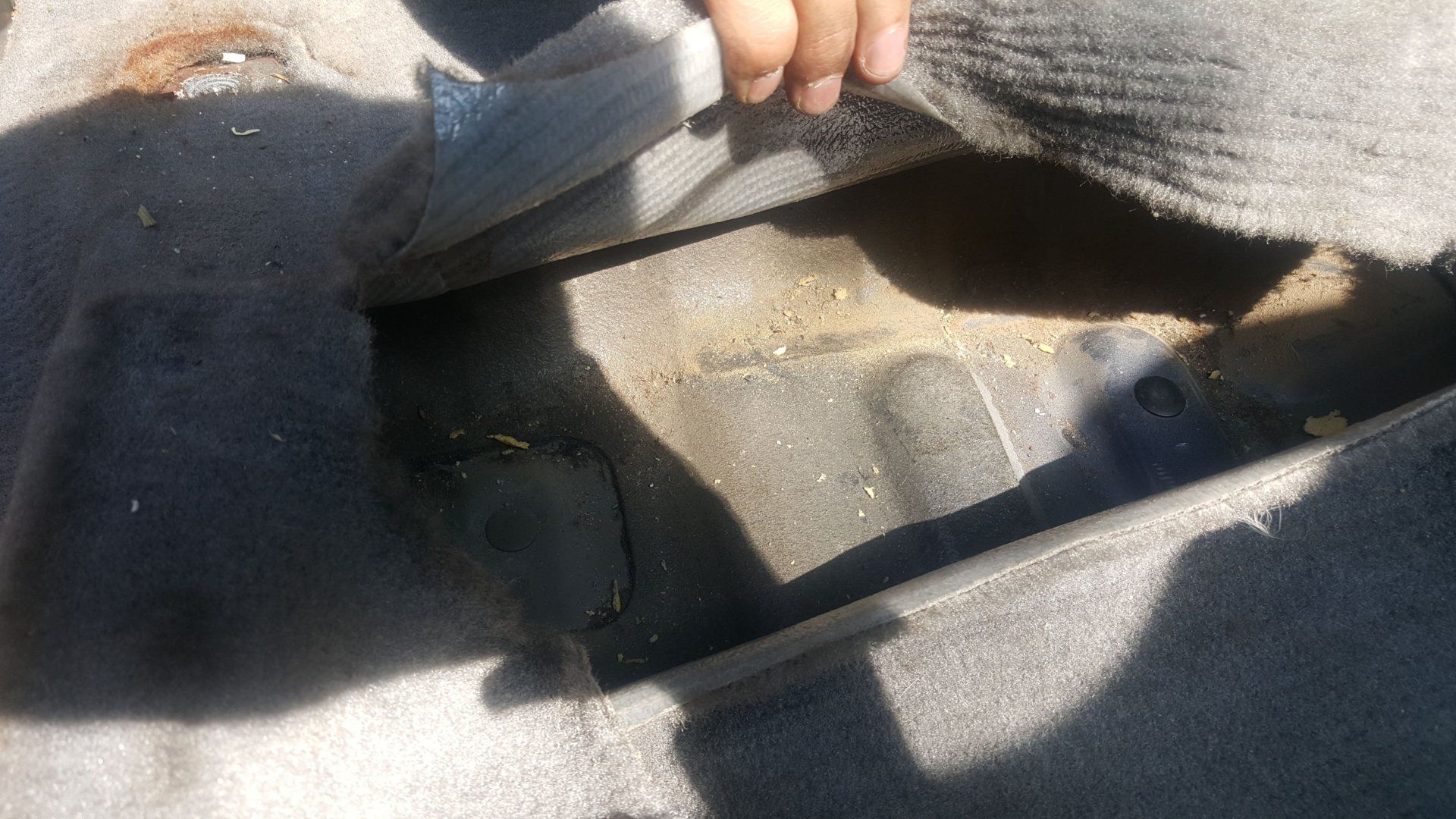 Under Front Passenger Carpet