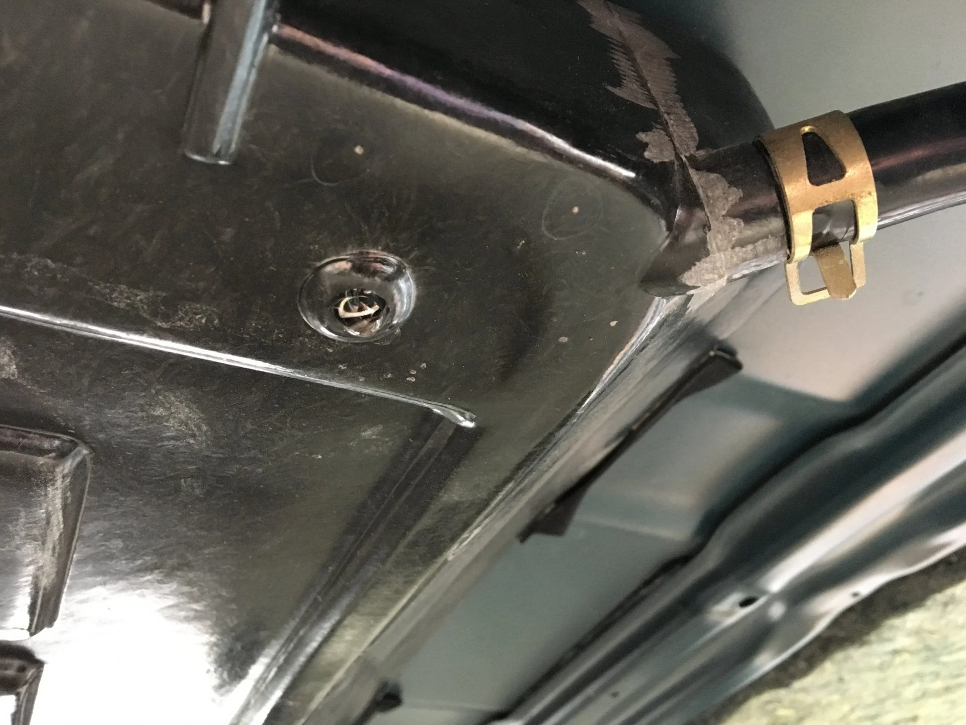 Water drop leaking near driver side rear drain line