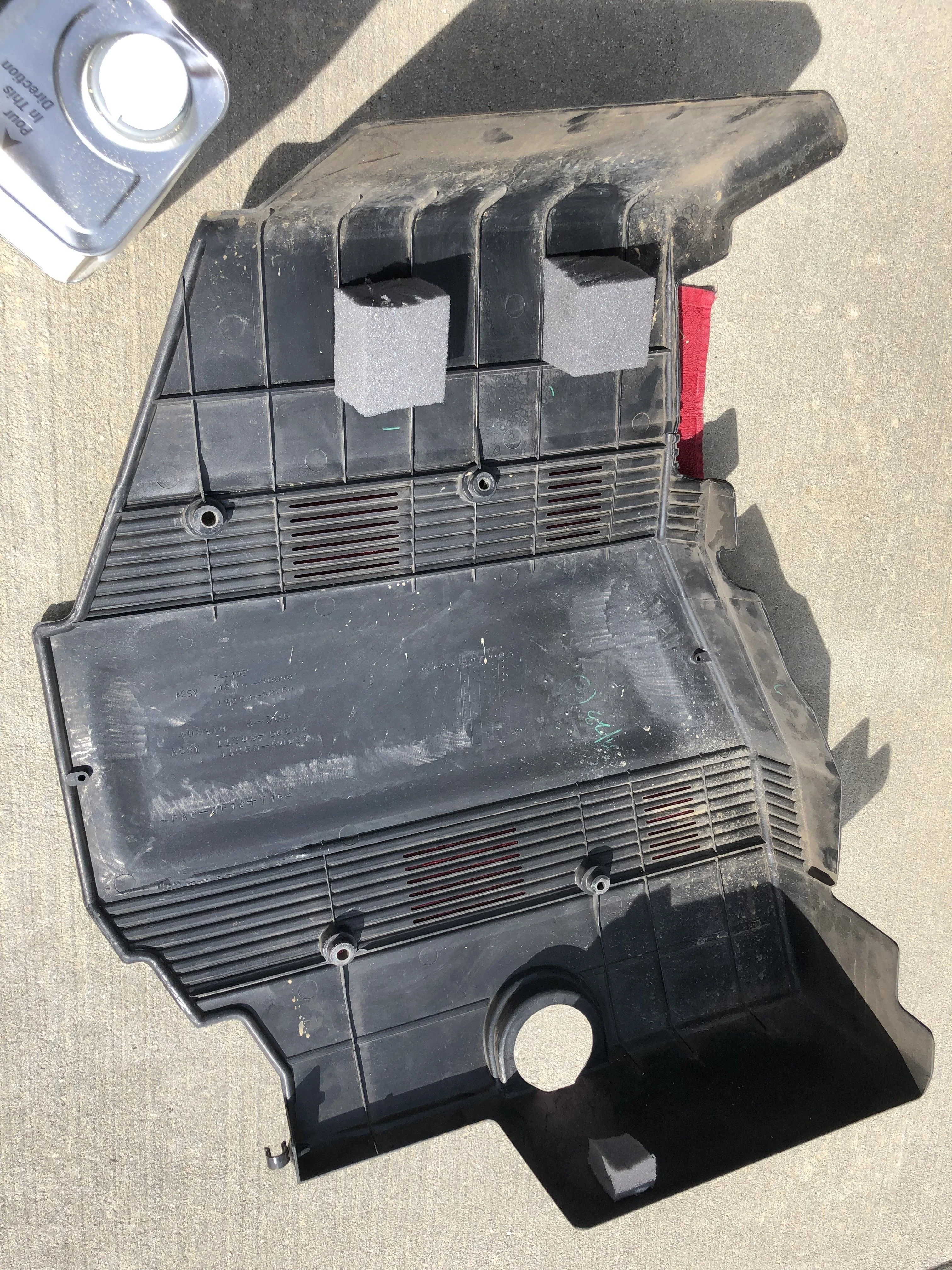 While I had the foam out, I glued some of it to my engine cover since the old foam disintegrated long ago. Helped the vibration at idle