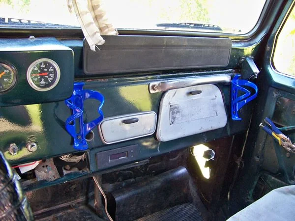 Yes those cupholders are ugly, and I did it!  Figured it couldn't get much worse at this point... at least they work!