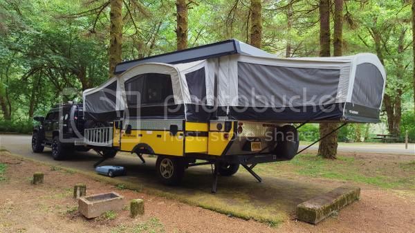 2008 Fleetwood E3 tent camper with ATV/cargo deck. $8500. Located in Central Oregon.