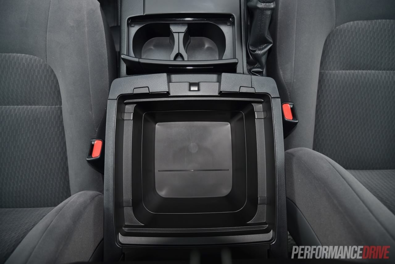 2016-_Toyota-_Land_Cruiser-_GX-console-storage-1280x.jpg